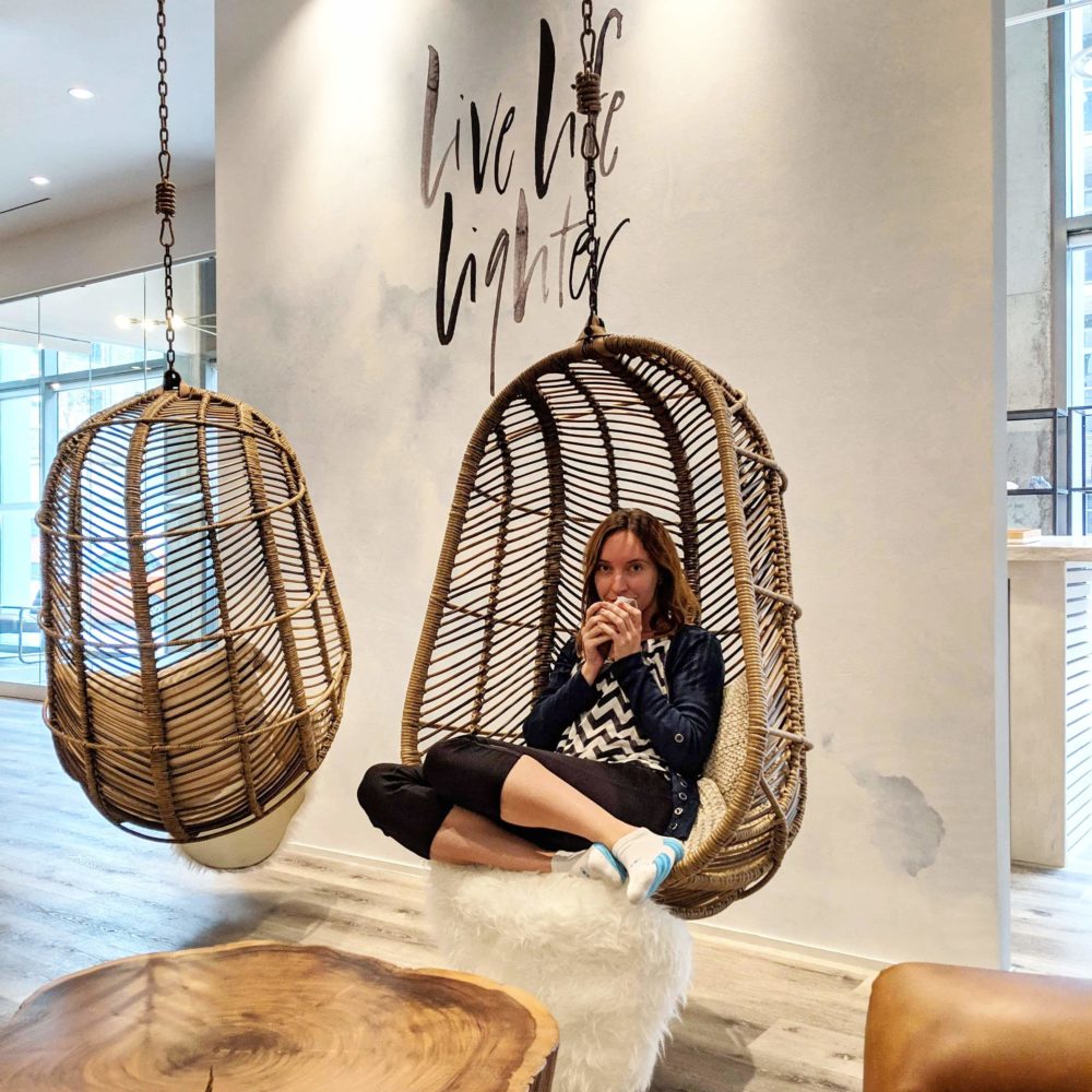 Enjoying a quiet moment in a hanging chair