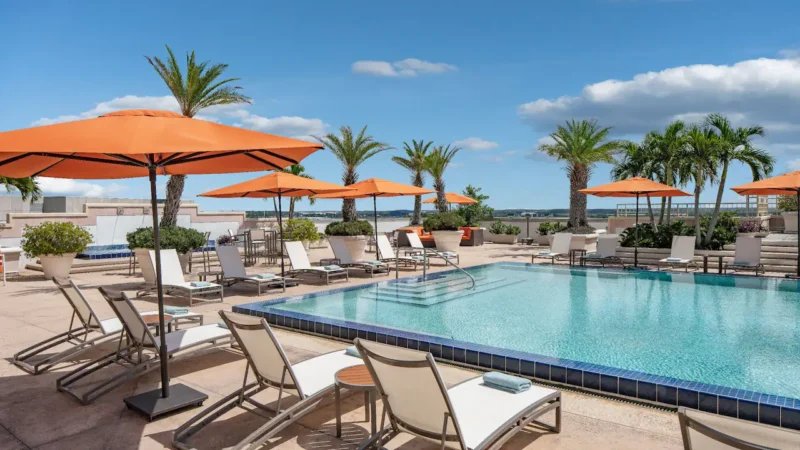 Large outdoor swimming pool on the roof deck of Hyatt Regency Orlando International Airport